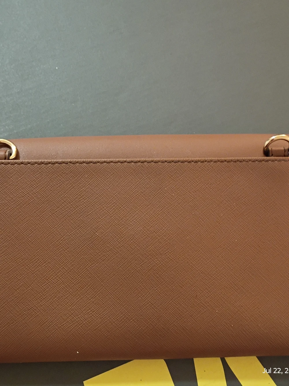 Michael Kors tan leather envelope clutch with gold logo
